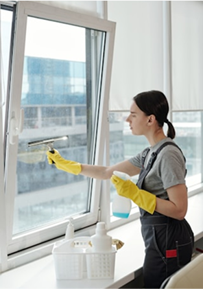 Person cleaning a window